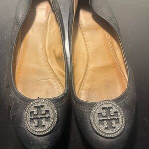 Tory Burch Black Flats with Rhinestone Medallion Logo